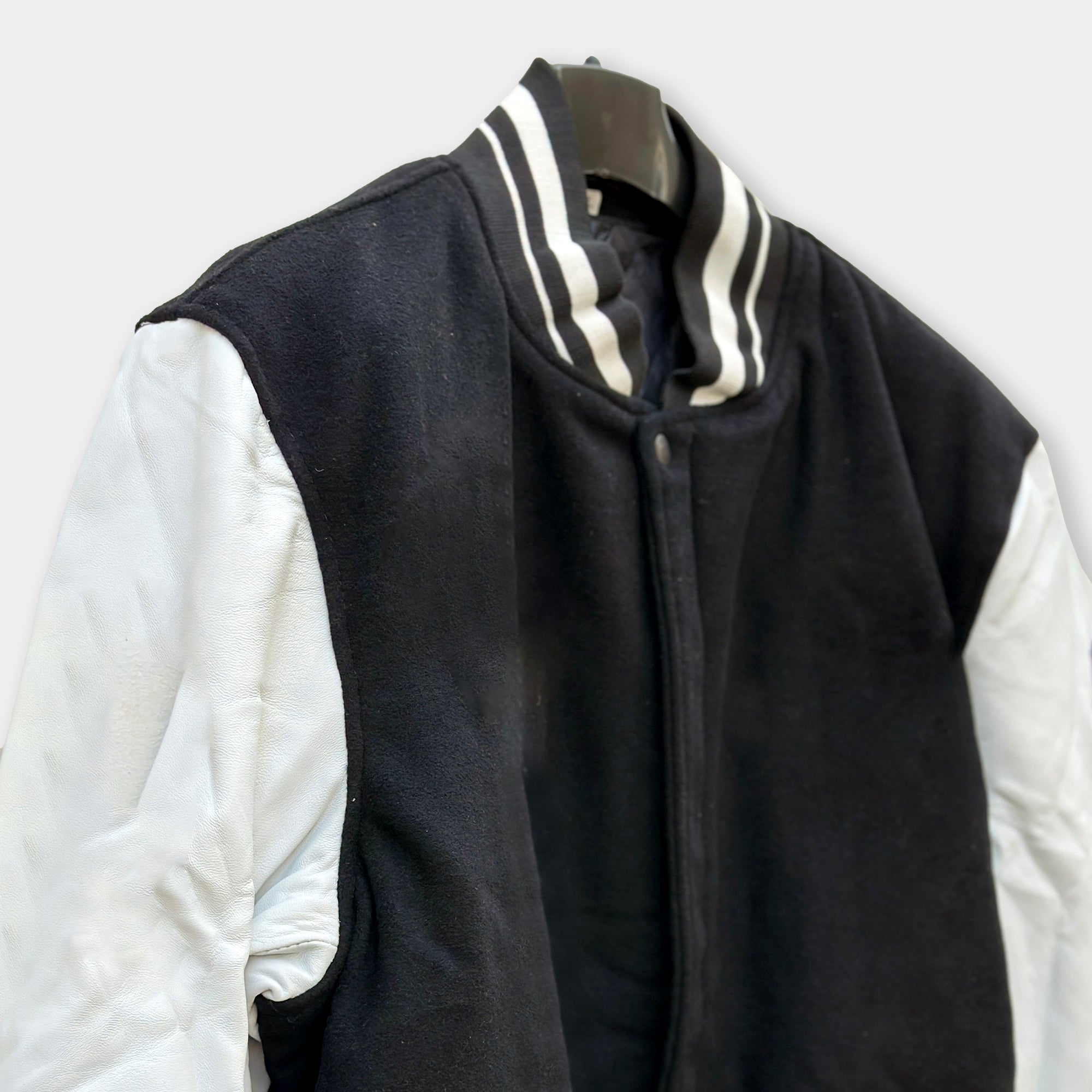 Men’s Black Varsity Jacket with White Leather Sleeves